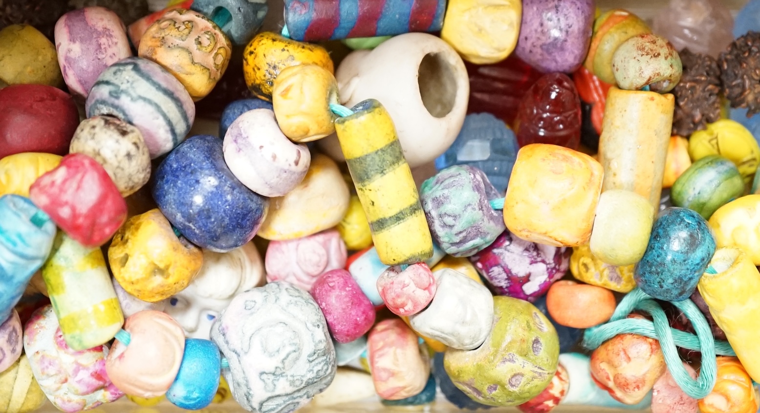 A collection of beads for necklaces and jewellery. Condition - varied